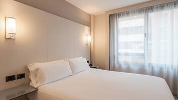 In-room safe, desk, blackout drapes, free cribs/infant beds