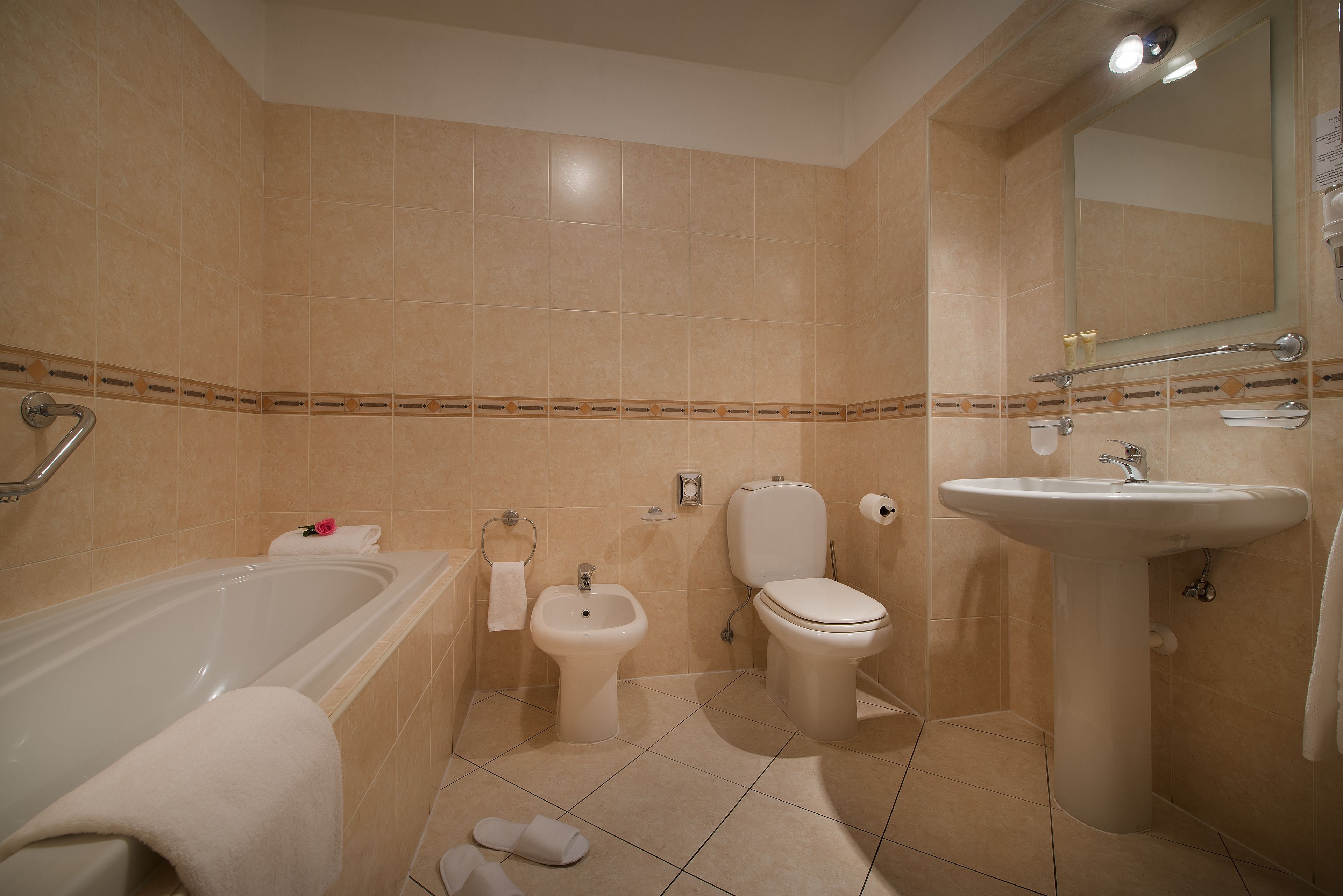 suite, city view | bathroom | designer toiletries, hair dryer, bathrobes, slippers