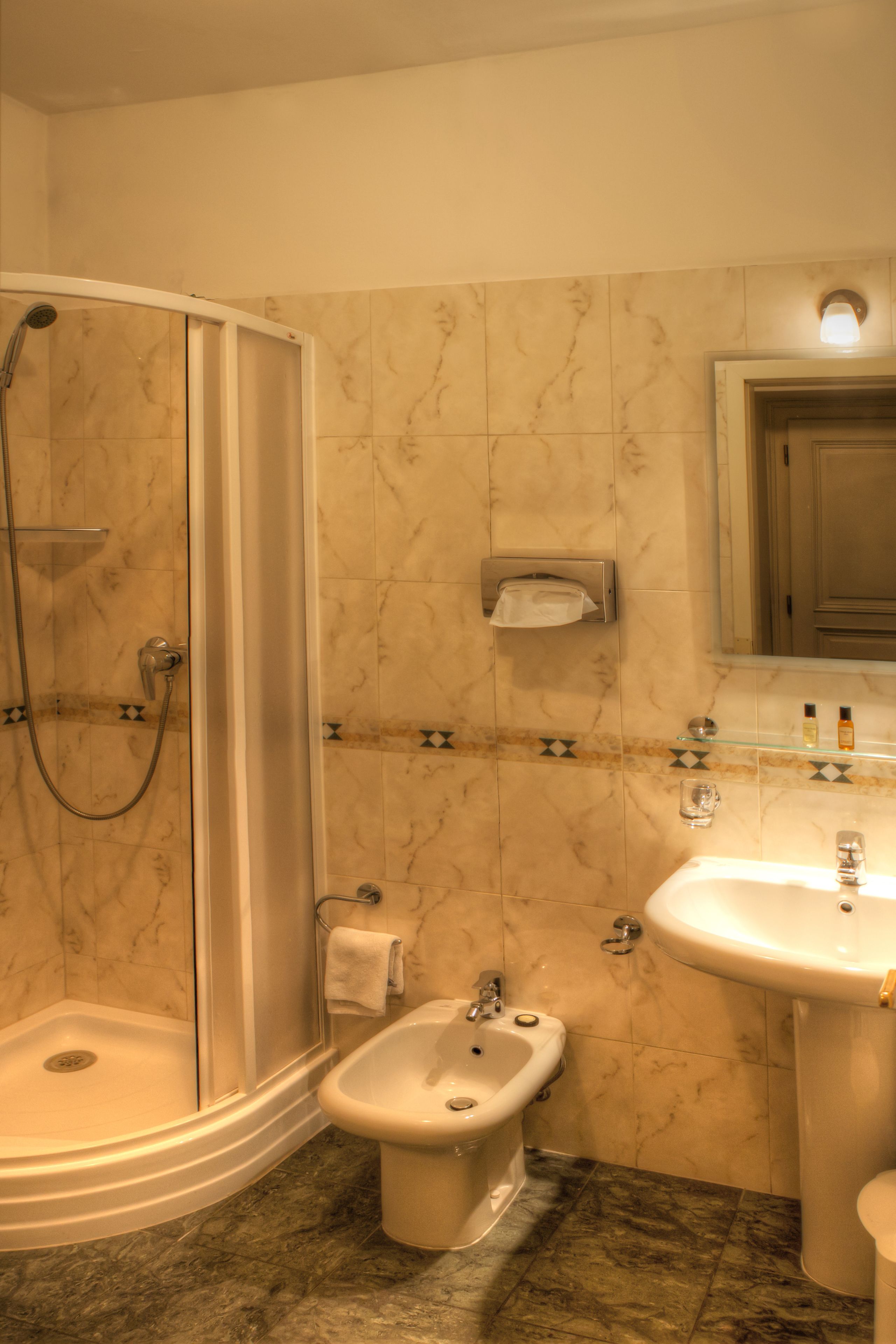 superior suite | bathroom | designer toiletries, hair dryer, bathrobes, slippers