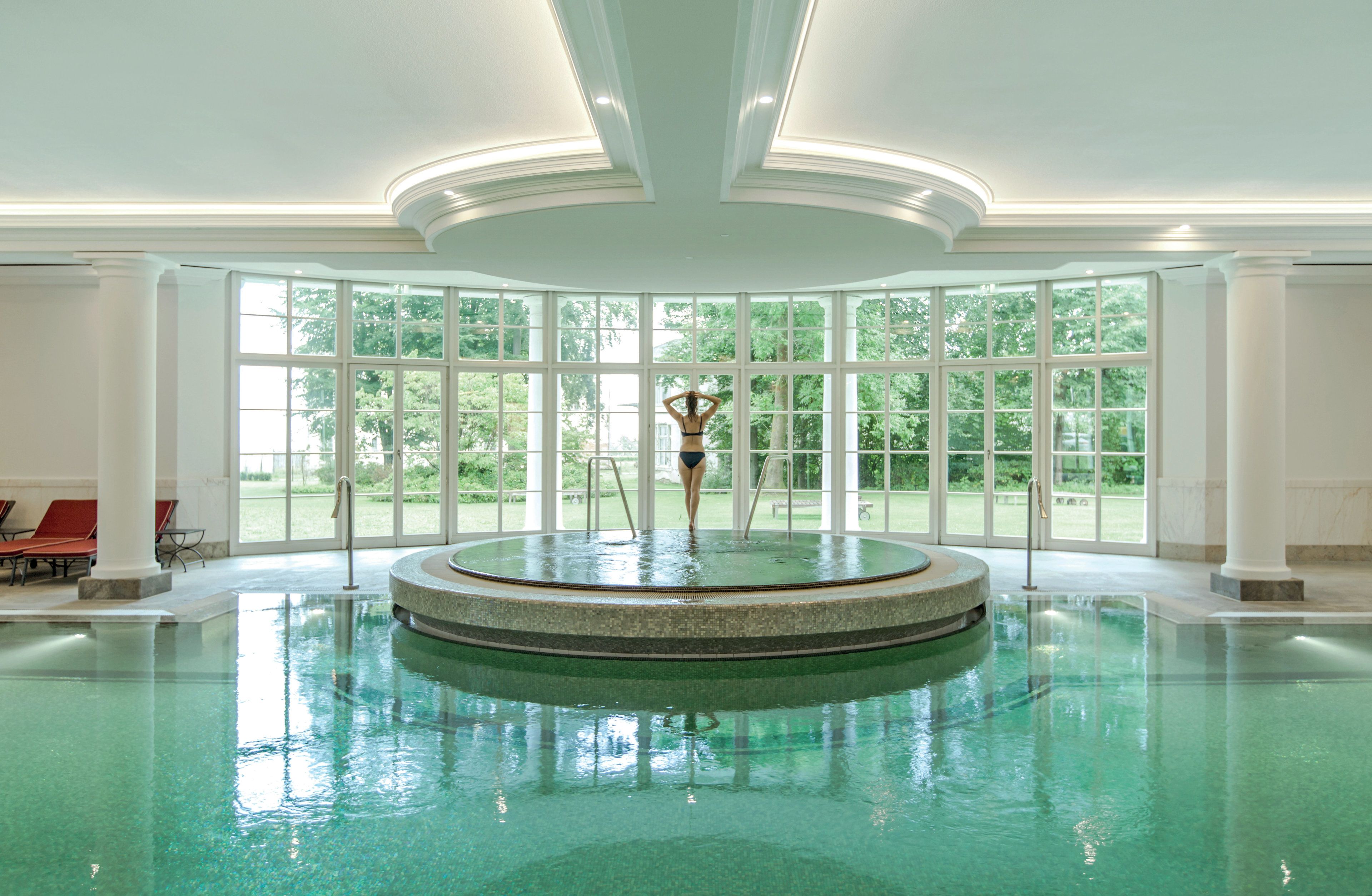 indoor pool, outdoor pool, pool loungers