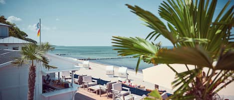 On the beach, windsurfing, beach bar, surfing