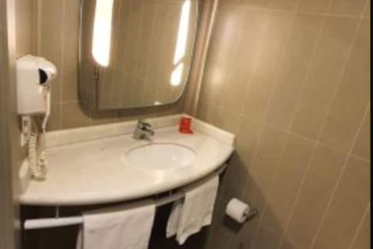 shower, eco-friendly toiletries, hair dryer, towels