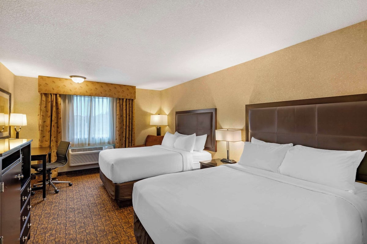 Standard Room, 2 Queen Beds, Non Smoking | Desk, laptop workspace, blackout drapes, iron/ironing board