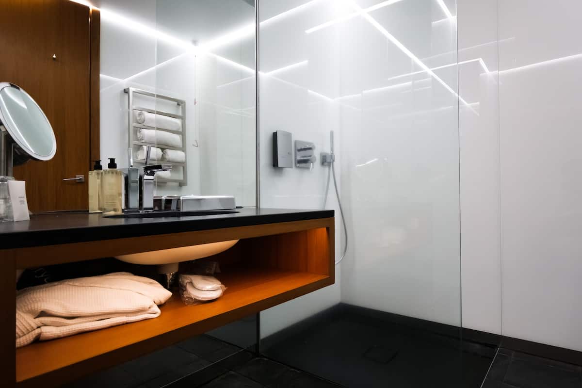 hair dryer, bathrobes, slippers, towels