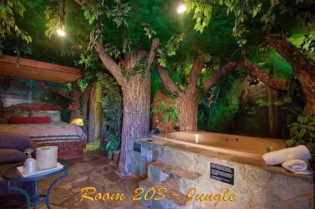 1 King Bed, Non Smoking, Jetted Tub Suite (Jungle, Cave, or 50s Theme) | Individually decorated, blackout drapes, soundproofing. Americas Best Value Inn & Suites Joshua Tree National Park
