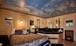1 King or 1 Queen Bed, Non Smoking, Jetted Tub Suite (Safari, Swimmers Paradise or Tahiti) | Individually decorated, blackout curtains, soundproofing