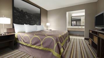 Desk, laptop workspace, blackout drapes, iron/ironing board