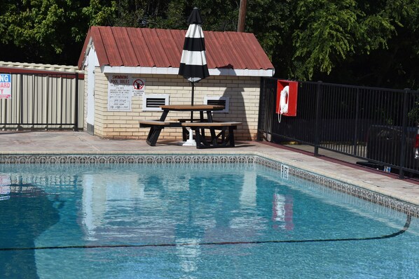 Outdoor pool, open 10 AM to 10 PM, pool umbrellas, sun loungers