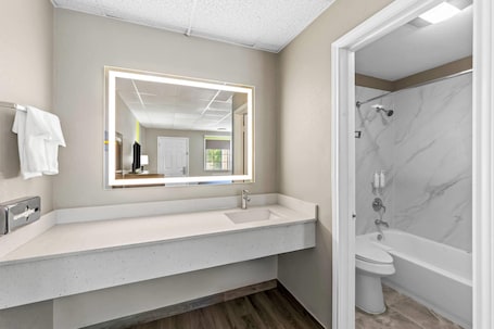 Combined shower/bathtub, free toiletries, hair dryer, towels. Super 8 by Wyndham Fredericksburg