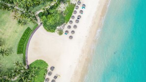 On the beach, white sand, beach shuttle, sun-loungers