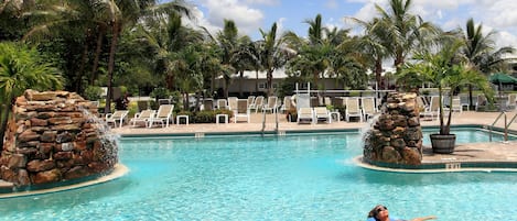 Outdoor pool, pool umbrellas, sun loungers