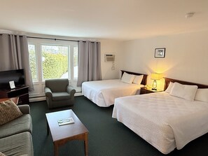 Habitación Deluxe | Tabla de planchar con plancha, wifi gratis, ropa de cama