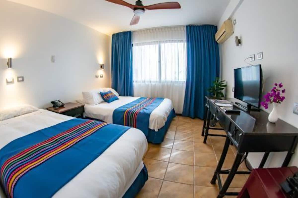 Economy Room | In-room safe, laptop workspace, free WiFi, bed sheets