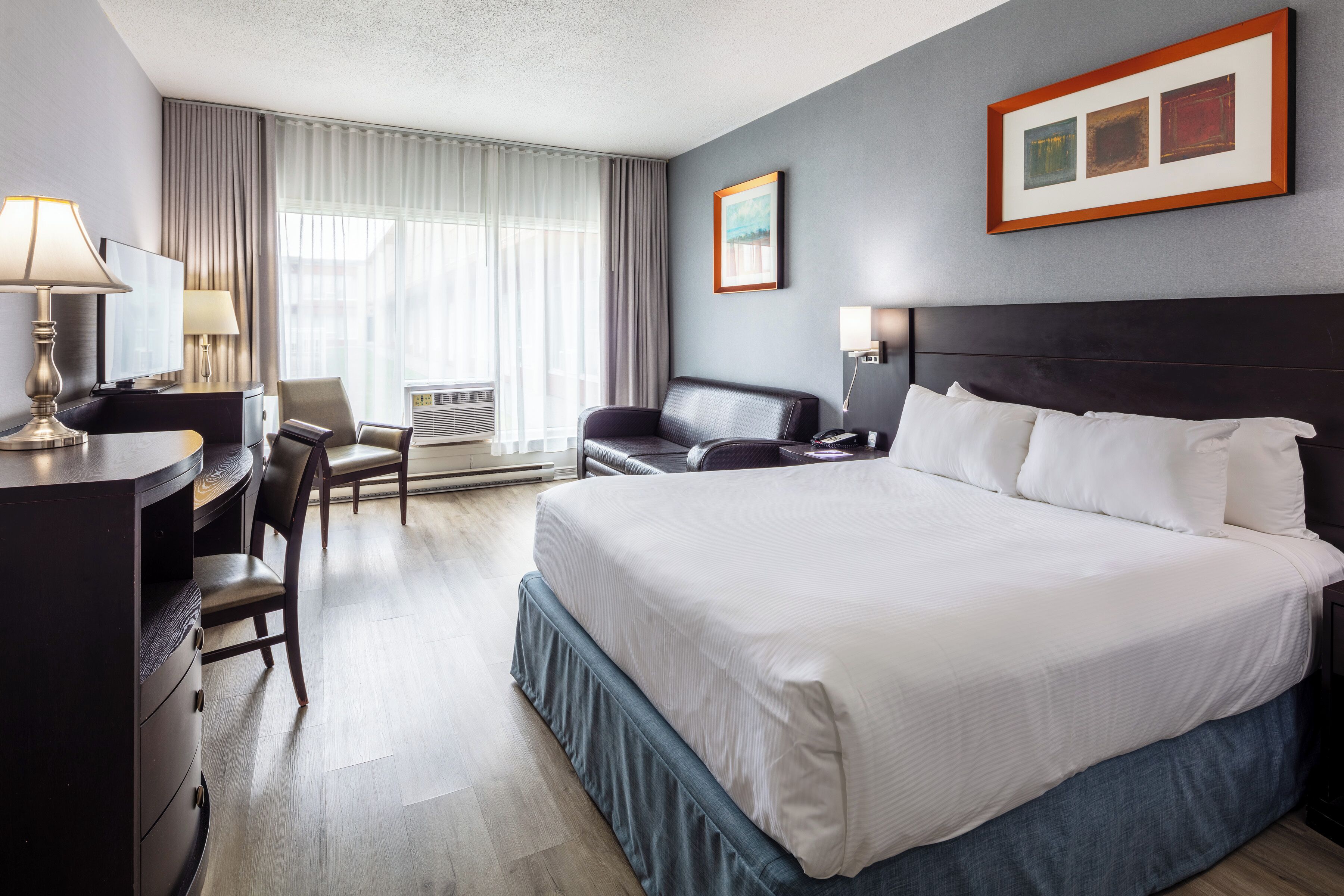 Desk, laptop workspace, blackout curtains, iron/ironing board