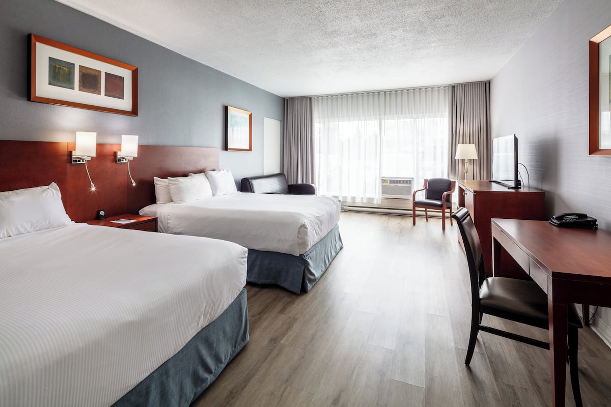 Deluxe Room, 2 Double Beds, Non Smoking | Desk, laptop workspace, blackout drapes, iron/ironing board