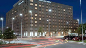 A large, multi-story building with the sign "Embassy Suites" indicating it is a hotel. - Embassy Suites Boston Logan Airport (Boston)