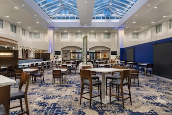 Hotel entrance and lobby at Embassy Suites Boston Logan Airport