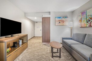 Suite, 1 King Bed, Non Smoking, Refrigerator & Microwave (with Sofabed) | Desk, laptop workspace, iron/ironing board, rollaway beds