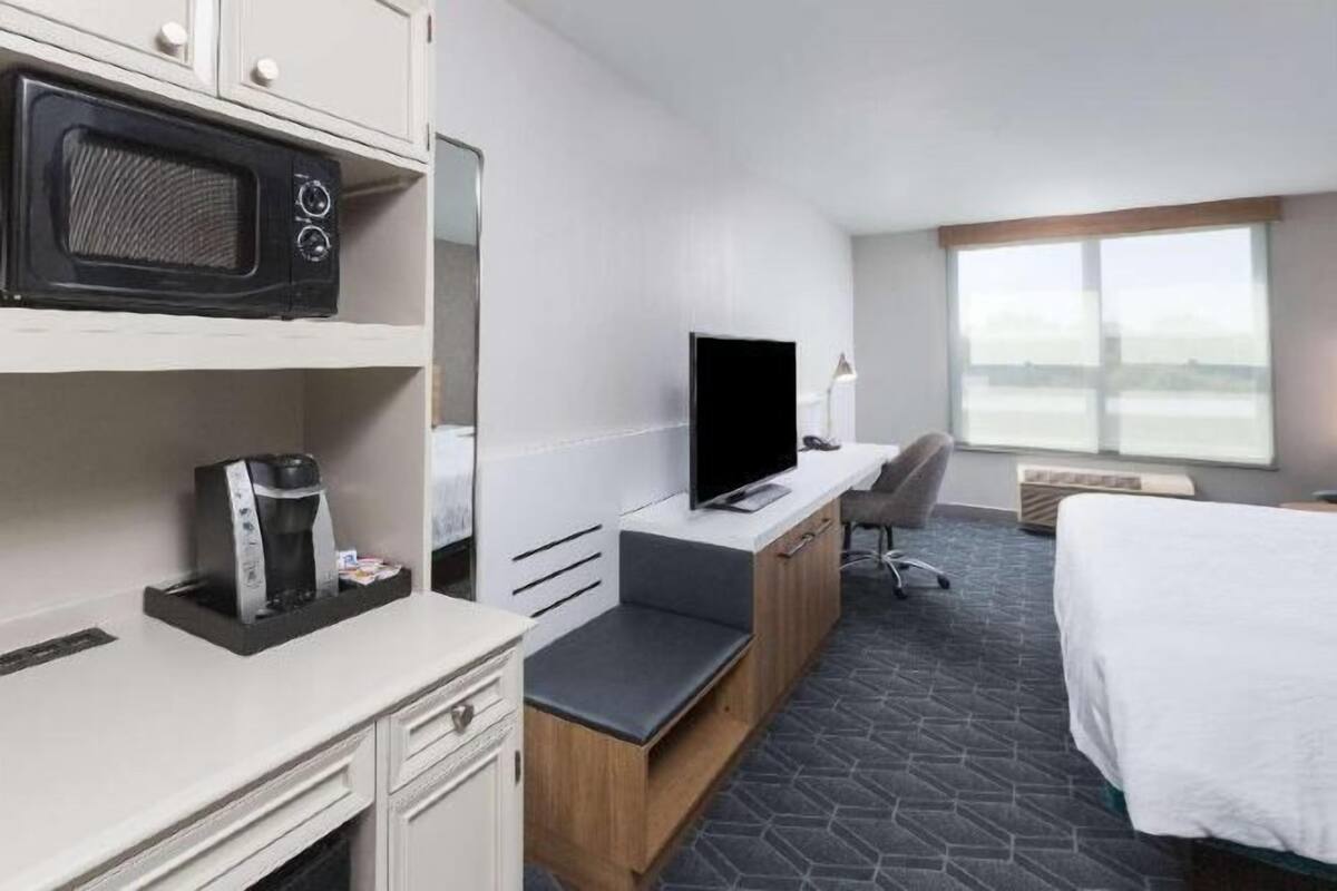 Hypo-allergenic bedding, desk, laptop workspace, iron/ironing board