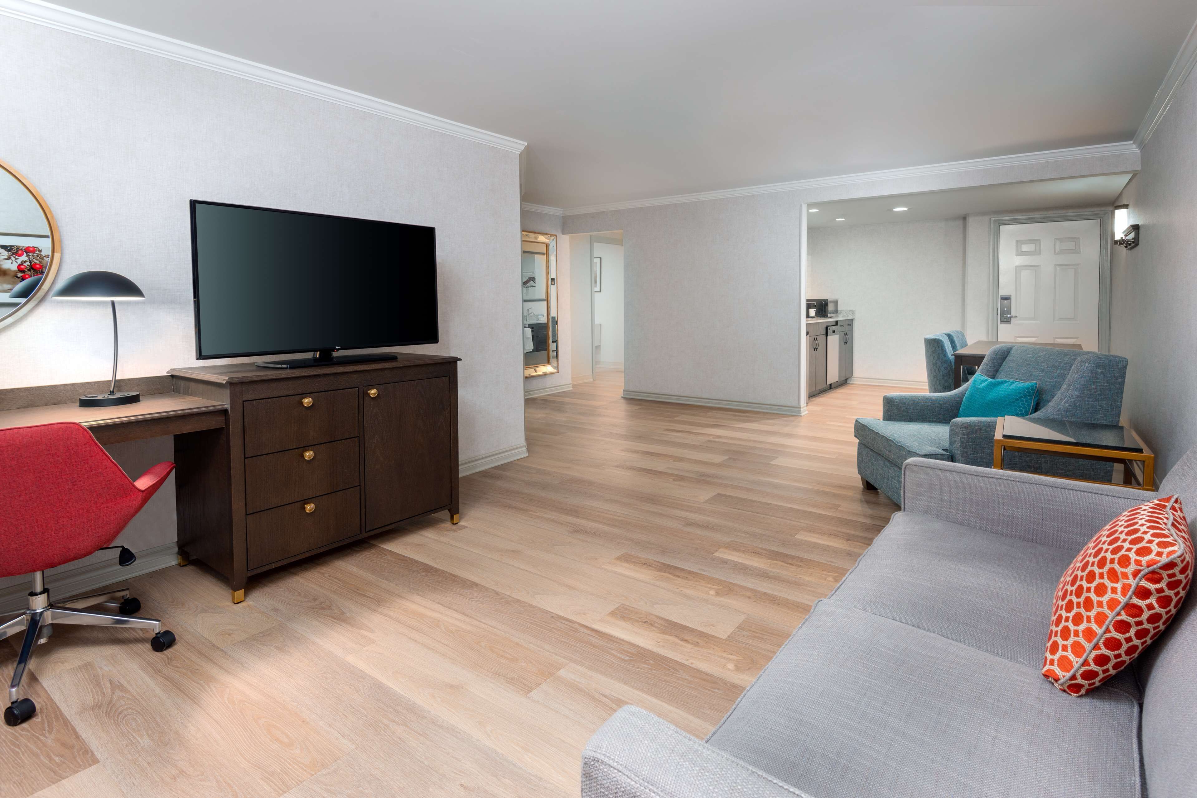 hypo-allergenic bedding, desk, blackout curtains, iron/ironing board