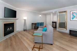 Studio, 1 King Bed with Sofa bed, Non Smoking, Fireplace | Living area | 49-inch flat-screen TV with cable channels, TV