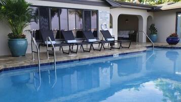 Outdoor pool, open 9:00 AM to 7:00 PM, sun loungers