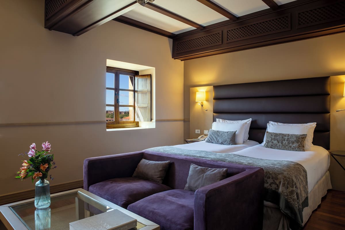Premium bedding, down duvets, memory-foam beds, minibar