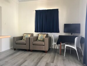32-cm flat-screen TV with satellite channels, TV, DVD player