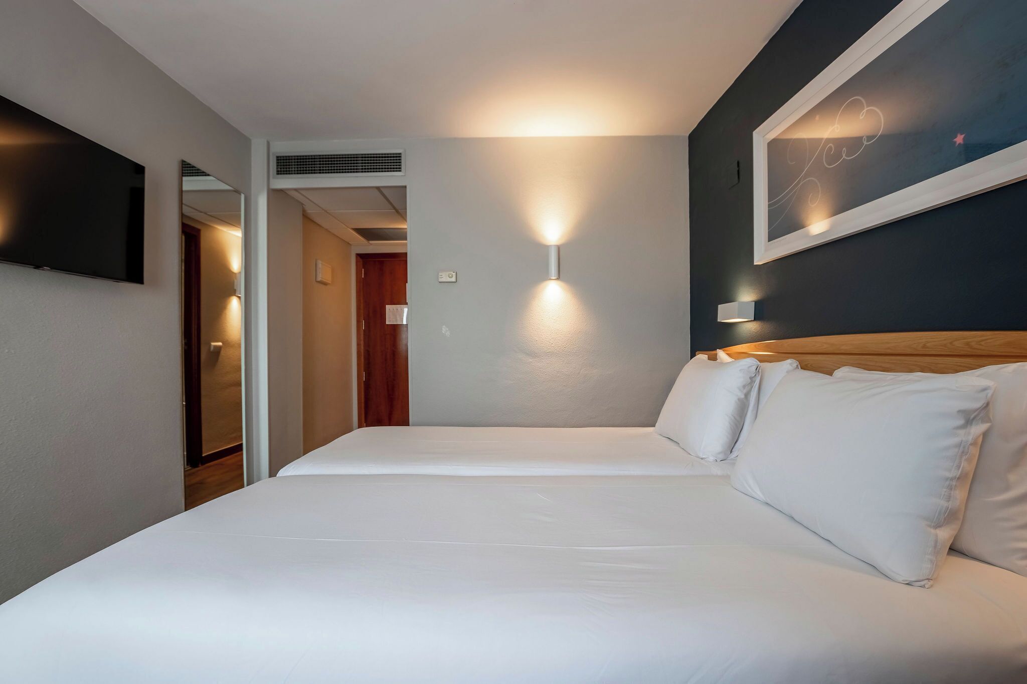 Desk, laptop workspace, free WiFi, bed sheets