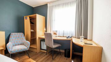 Desk, laptop workspace, free WiFi, bed sheets