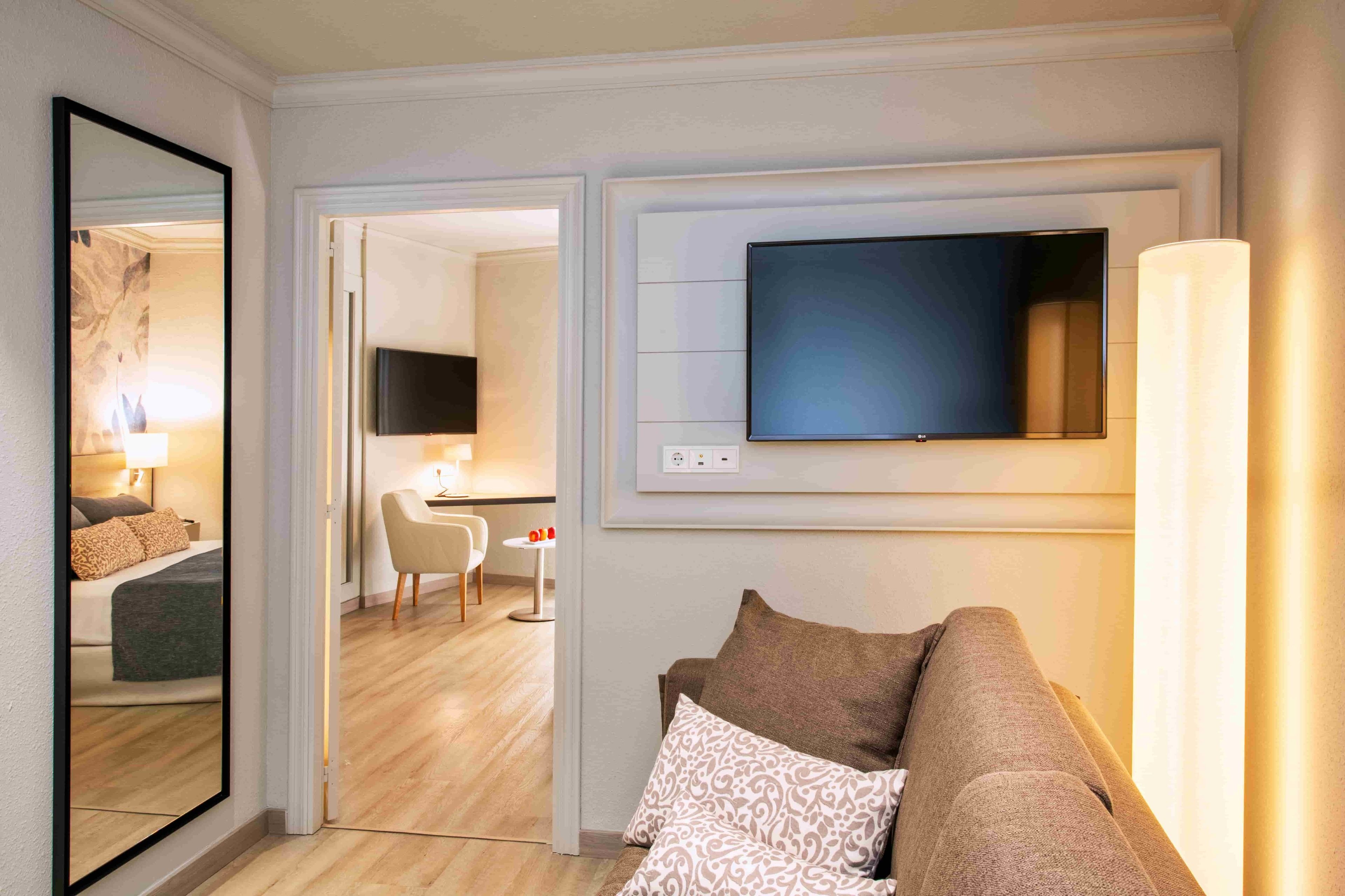 family room | in-room safe, desk, laptop workspace, blackout curtains