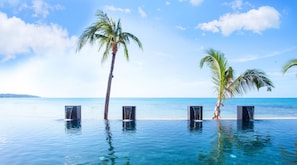 2 outdoor pools, open 7:00 AM to 8:00 PM, pool umbrellas, sun loungers