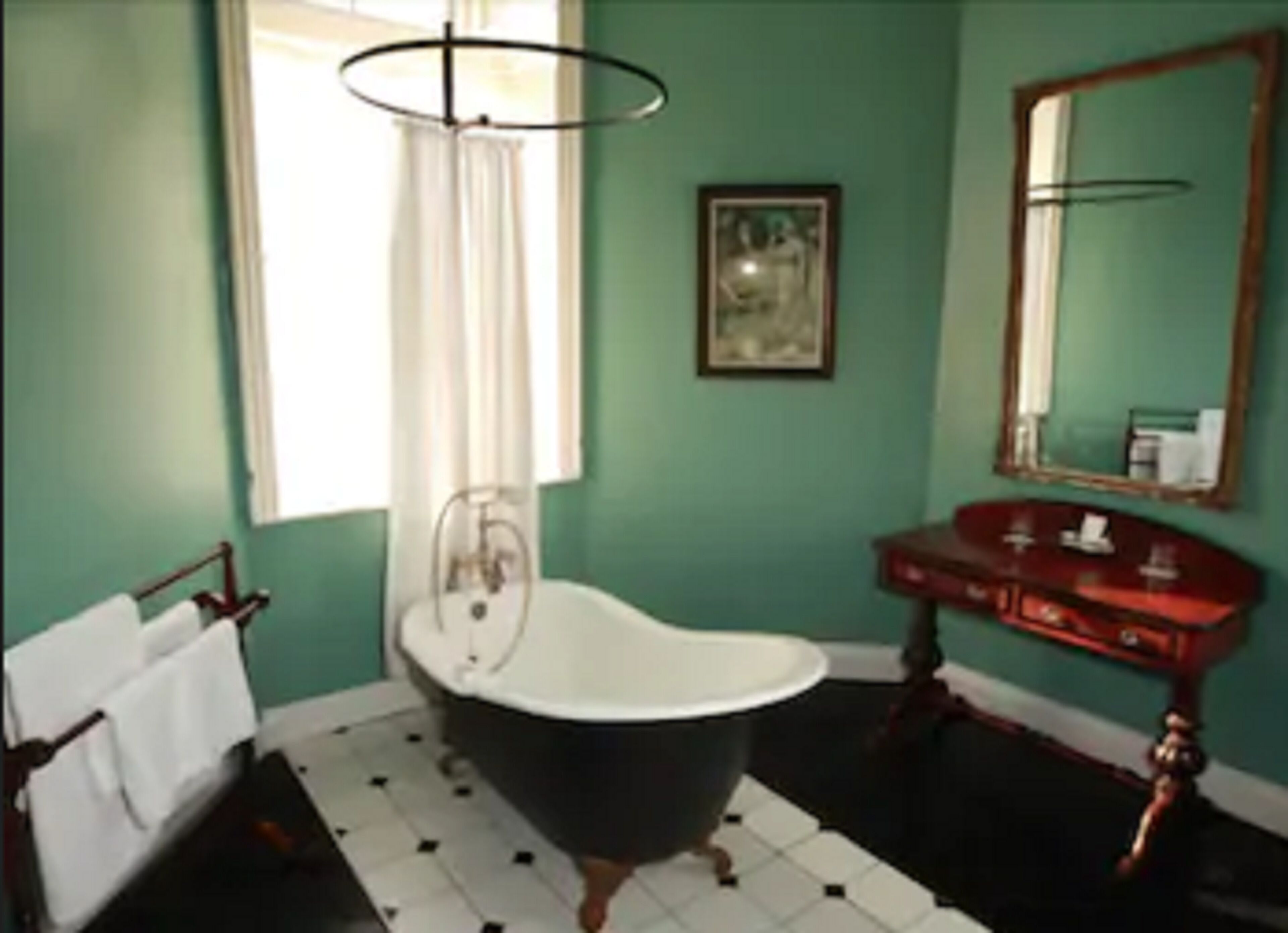 designer toiletries, hair dryer, towels