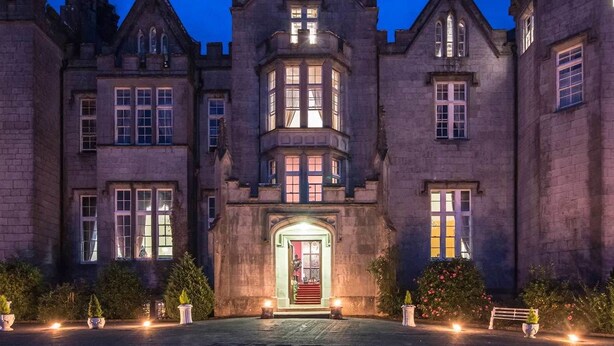 A large, historic building with a prominent entrance and multiple windows, likely a hotel or similar accommodation. - Kinnitty Castle Hotel (Kinnitty)