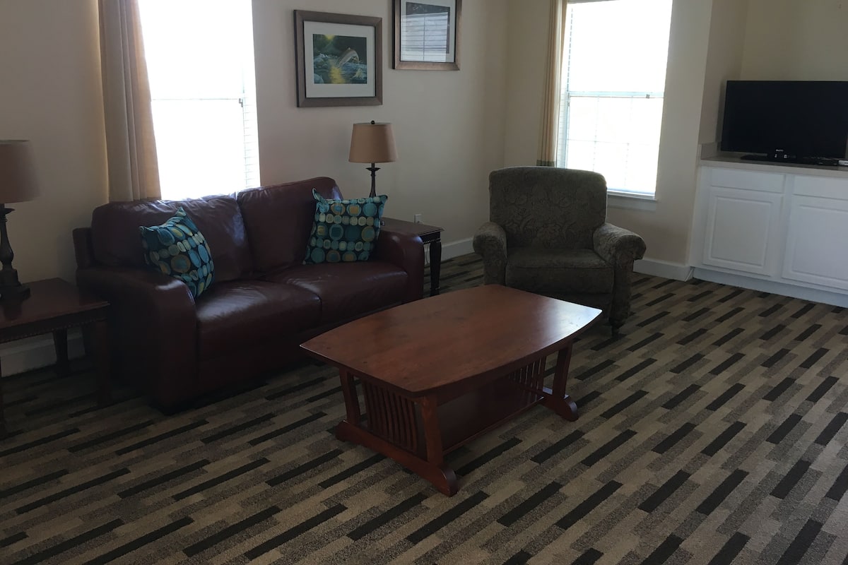 Standard Room, 2 Double Beds (Off-site Condo) | Living area | 42-inch TV with satellite channels