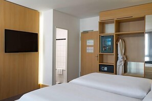 Roupas de cama antialérgicas, frigobar, cofres nos quartos, escrivaninha