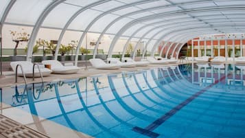 Indoor pool, outdoor pool, open 11:00 AM to 9:00 PM, pool loungers