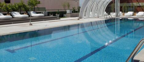 Indoor pool, outdoor pool, open 11:00 AM to 9:00 PM, pool loungers
