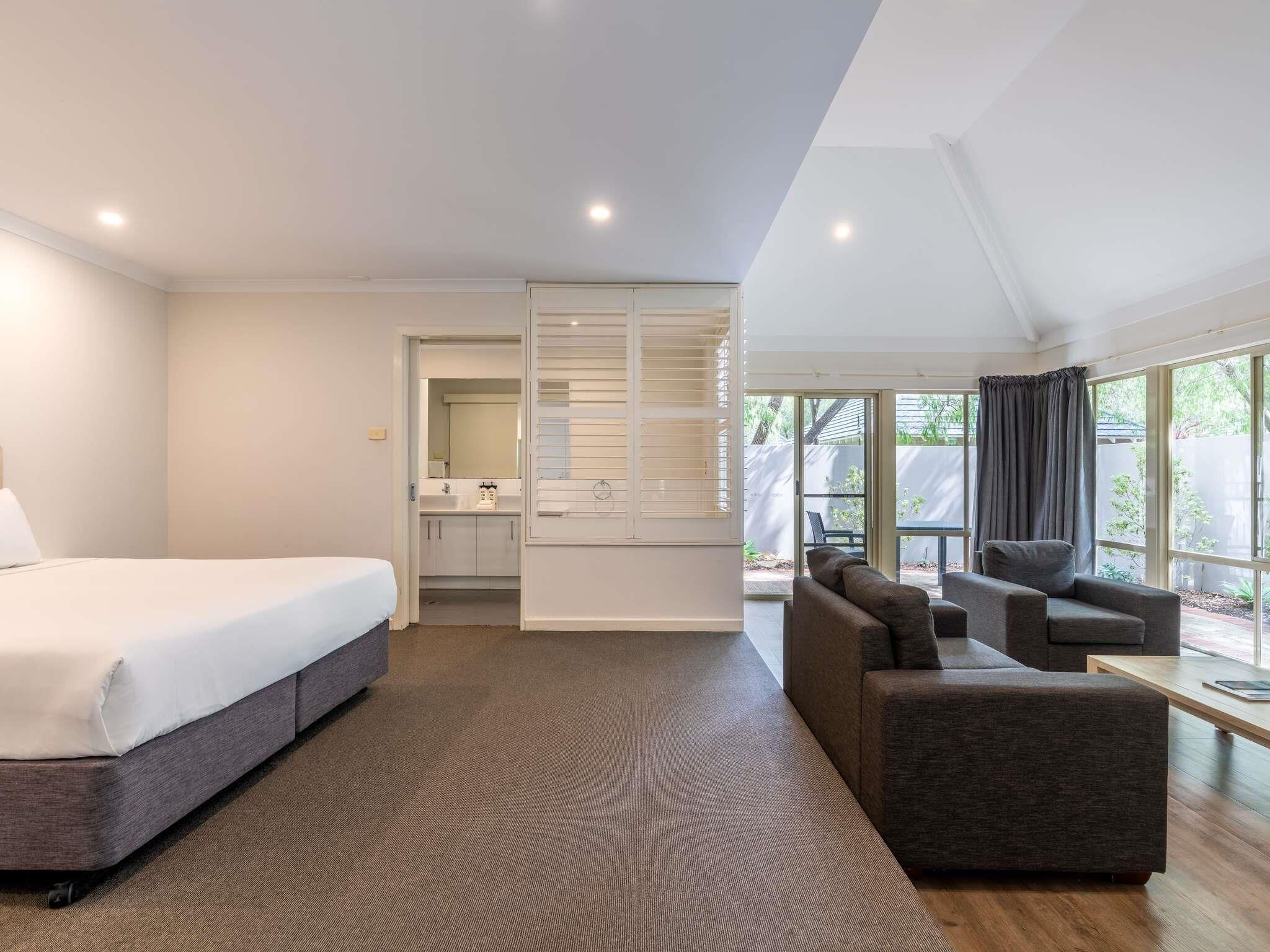 Executive Villa, 1 King Bed | Individually furnished, desk, laptop workspace, iron/ironing board