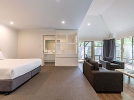 Executive Villa, 1 King Bed | Individually furnished, desk, laptop workspace, iron/ironing board
