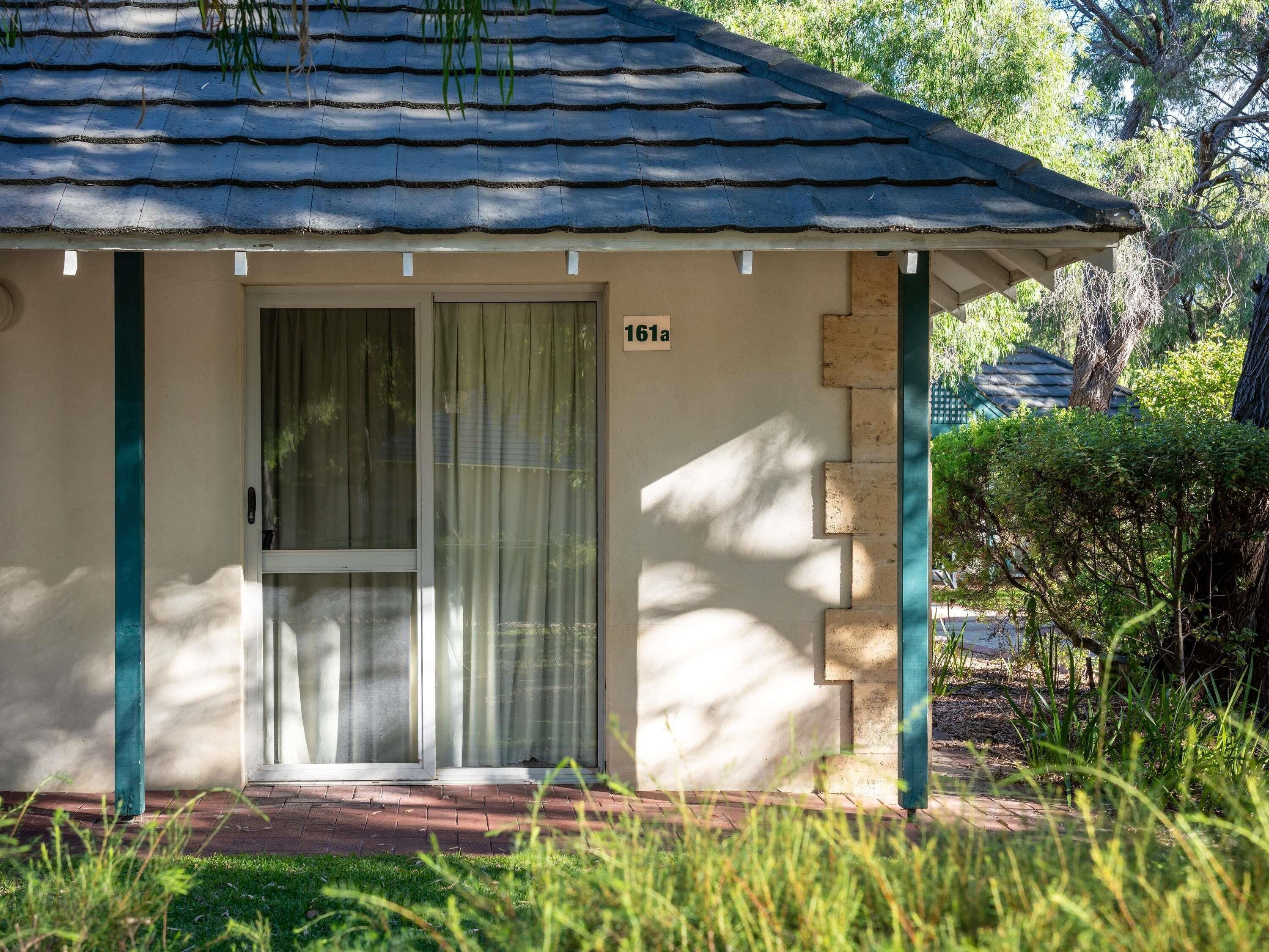 Individually furnished, desk, laptop workspace, iron/ironing board