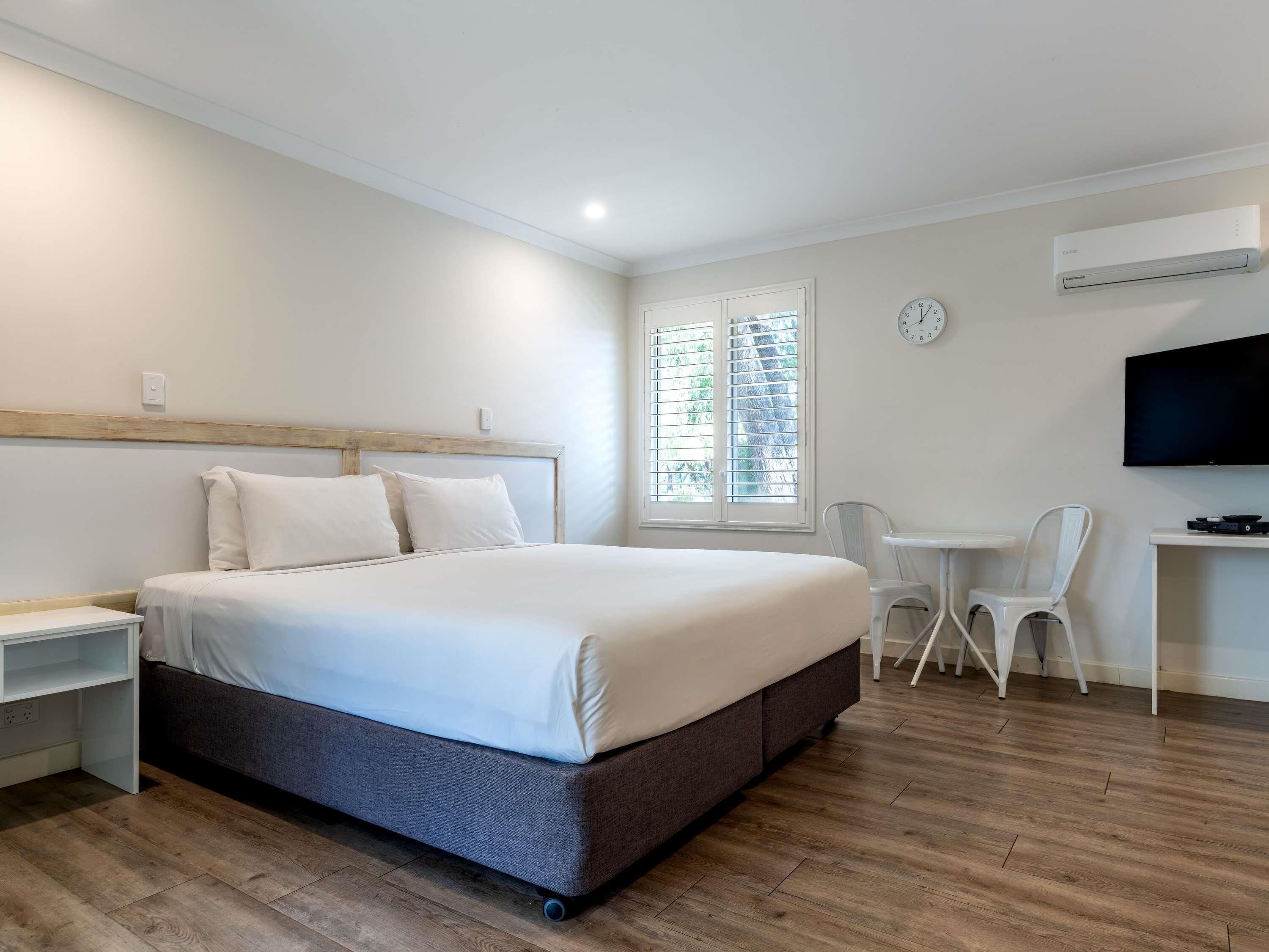 Individually furnished, desk, laptop workspace, iron/ironing board