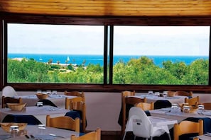 Breakfast, lunch, dinner served; local cuisine
