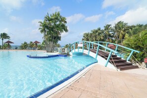 2 outdoor pools, pool umbrellas, sun loungers
