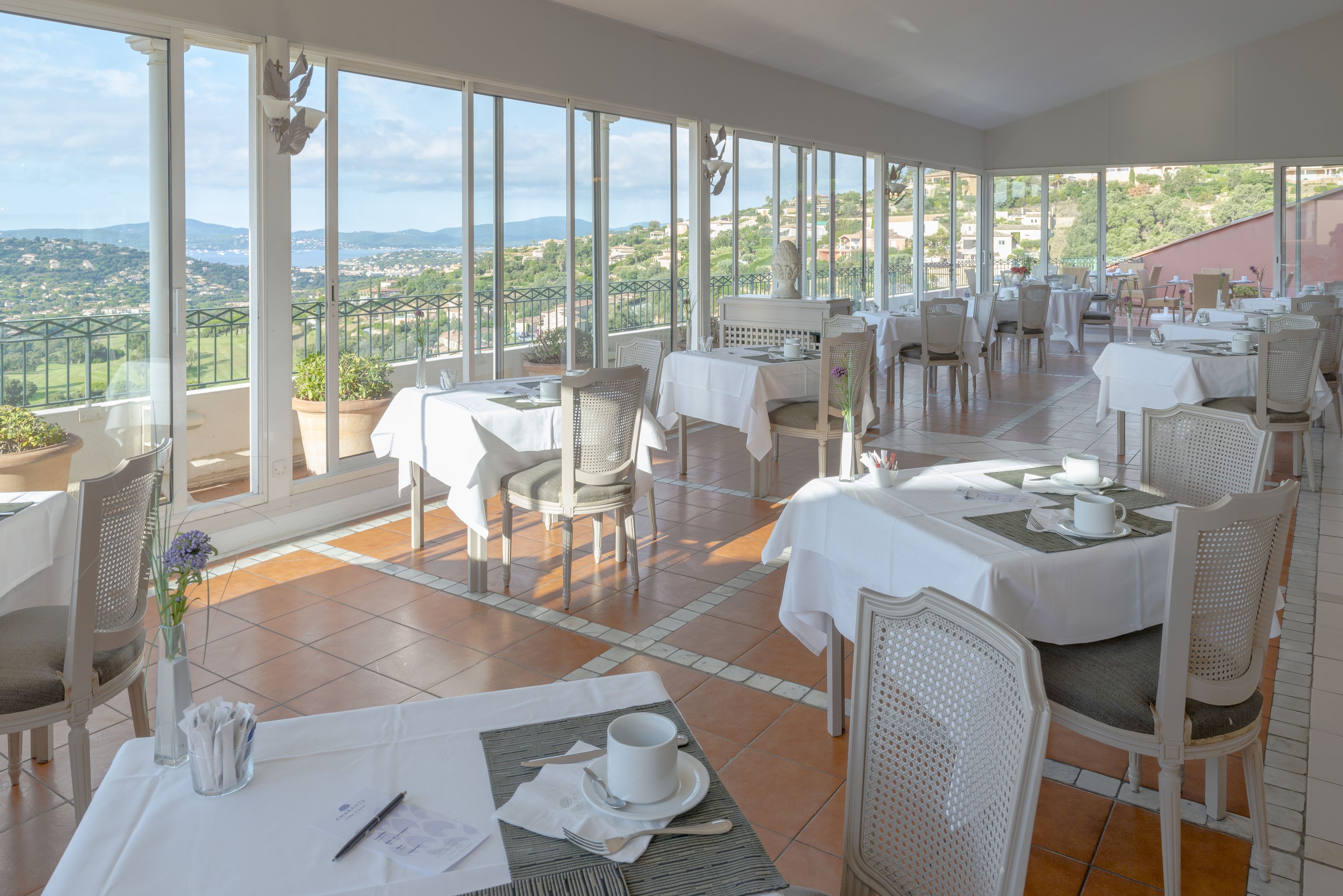 Breakfast, dinner served; Mediterranean cuisine, golf course views 