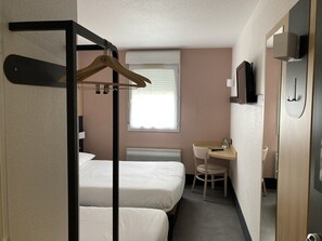 Triple Room, Non Smoking | Desk, iron/ironing board, free WiFi, bed sheets