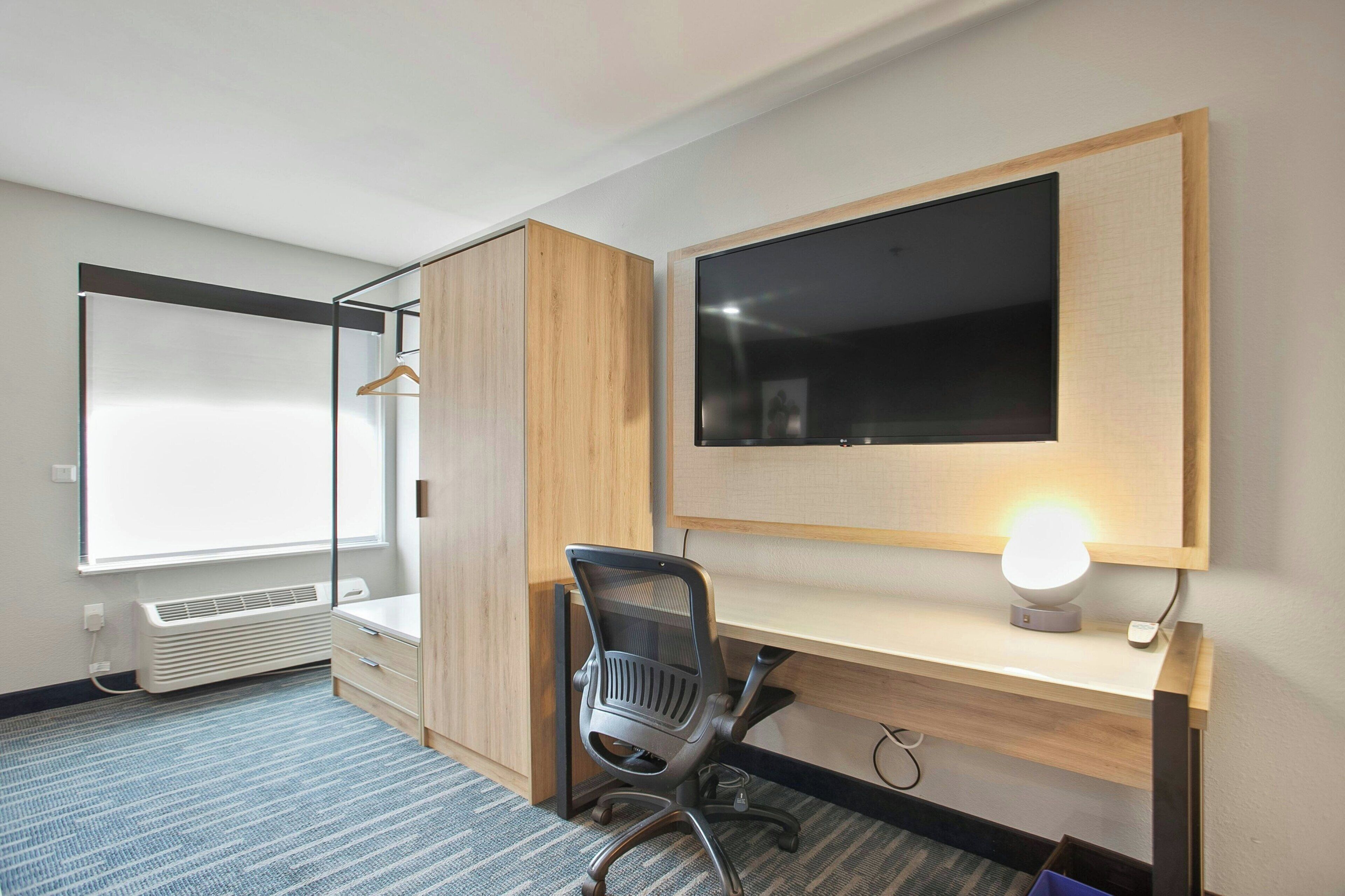 premium bedding, desk, laptop workspace, iron/ironing board