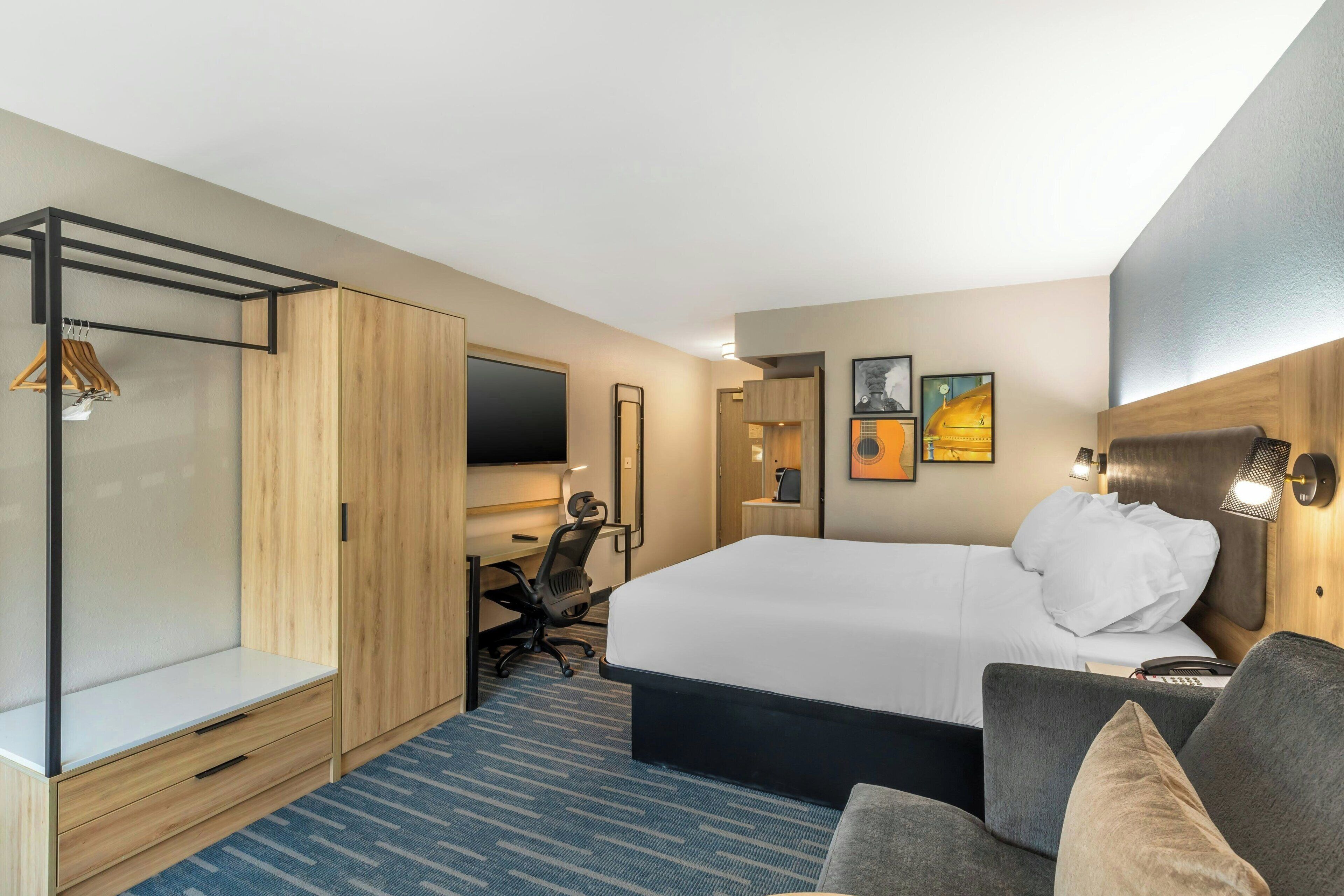 premium bedding, desk, laptop workspace, iron/ironing board