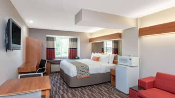 Studio Suite, 1 King Bed, Non Smoking | Down comforters, desk, blackout drapes, iron/ironing board