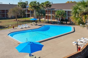 Outdoor pool, open 9:00 AM to 10:00 PM, pool loungers